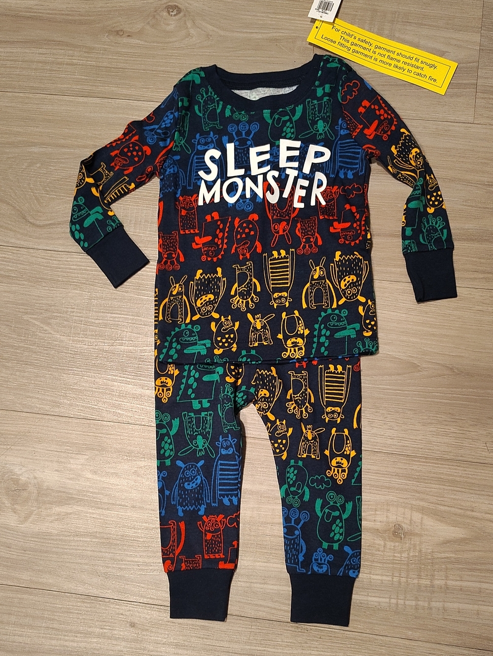 Old Navy Navy Kids Pajama Set with Red, Green, Yellow & Blue Monster Print